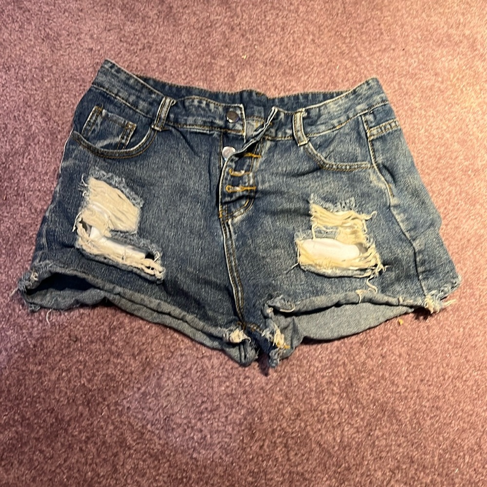 Blue jean shorts with button fly